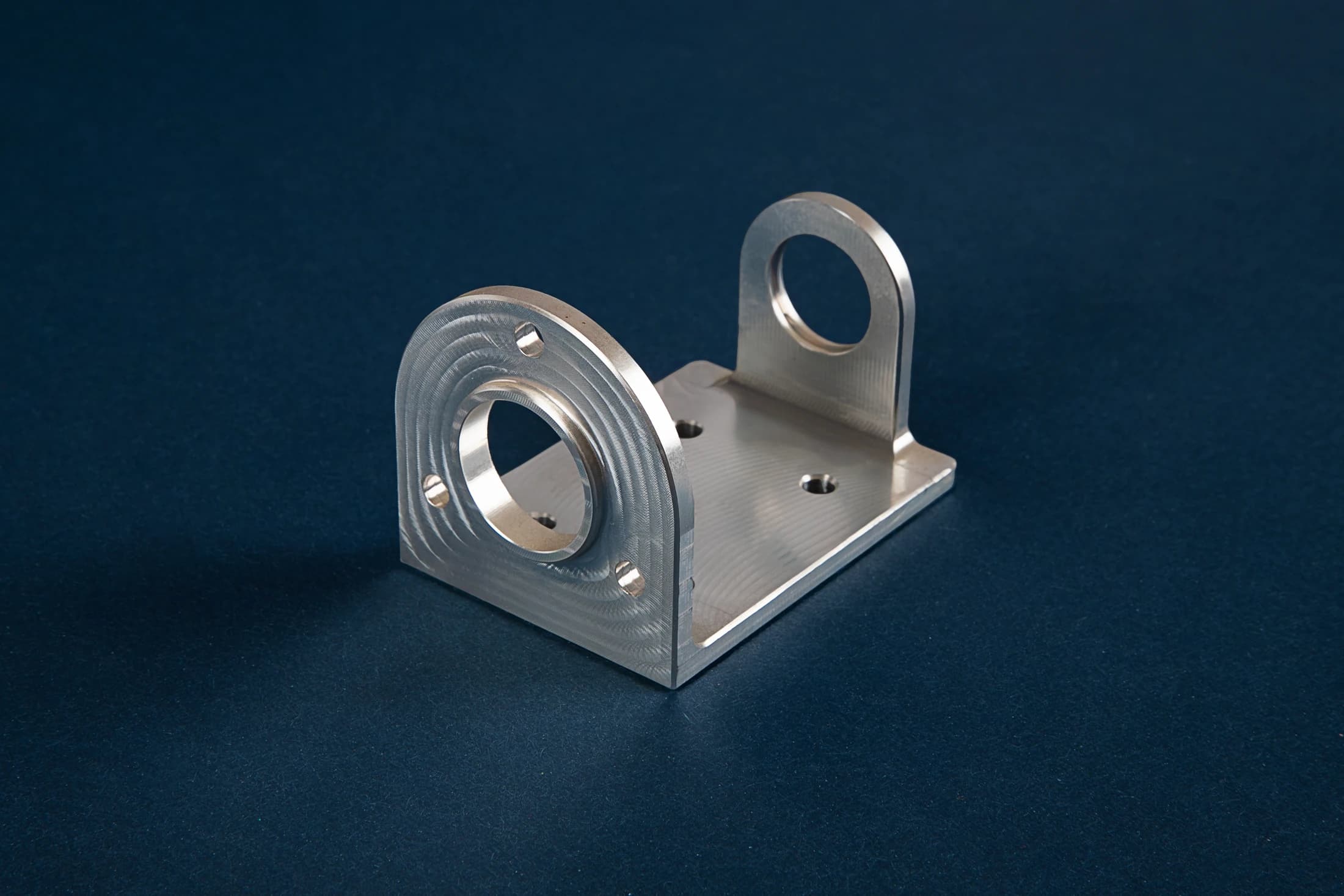 Support part with openings on a dark blue background
