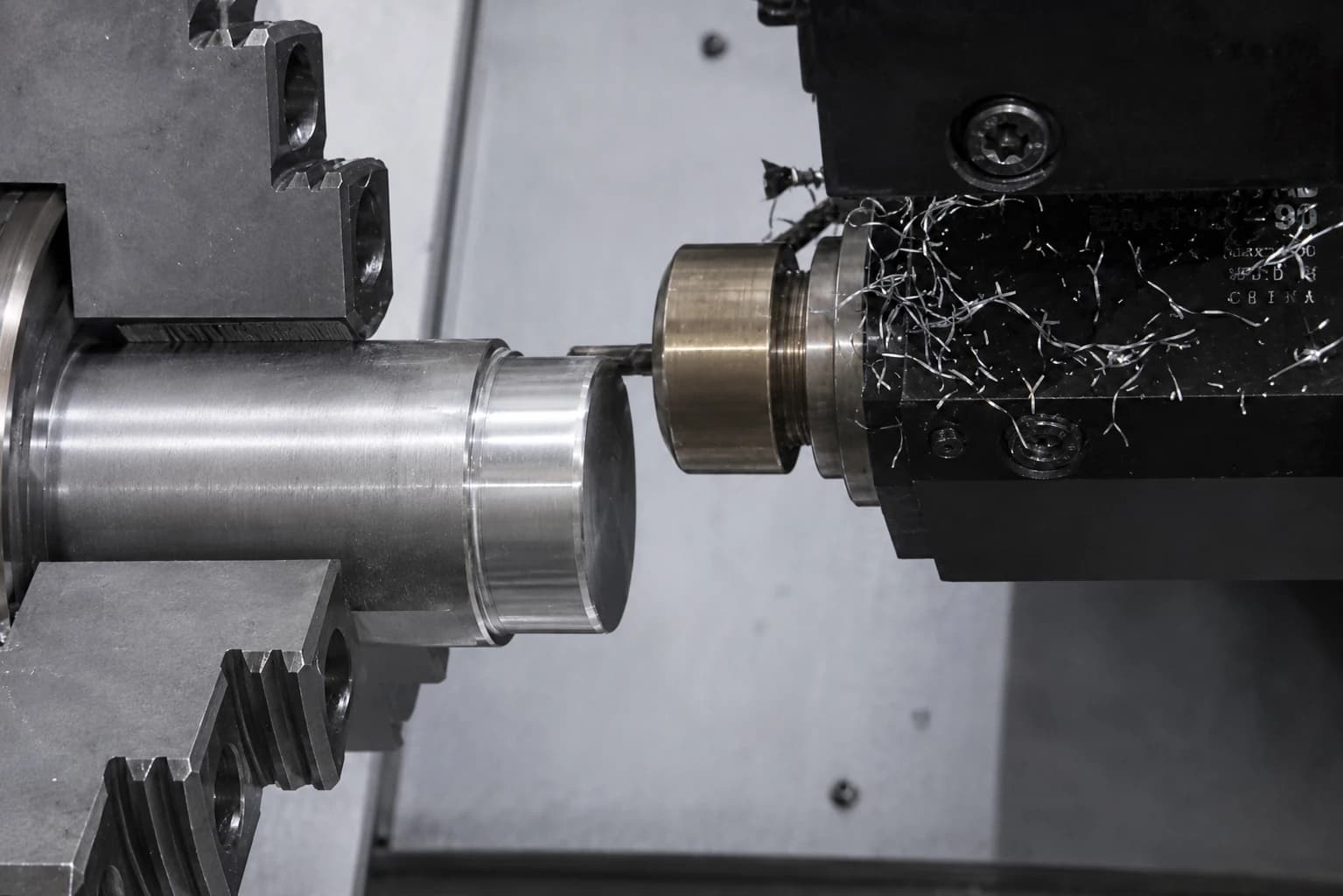 Close-up of a cylindrical part being turned